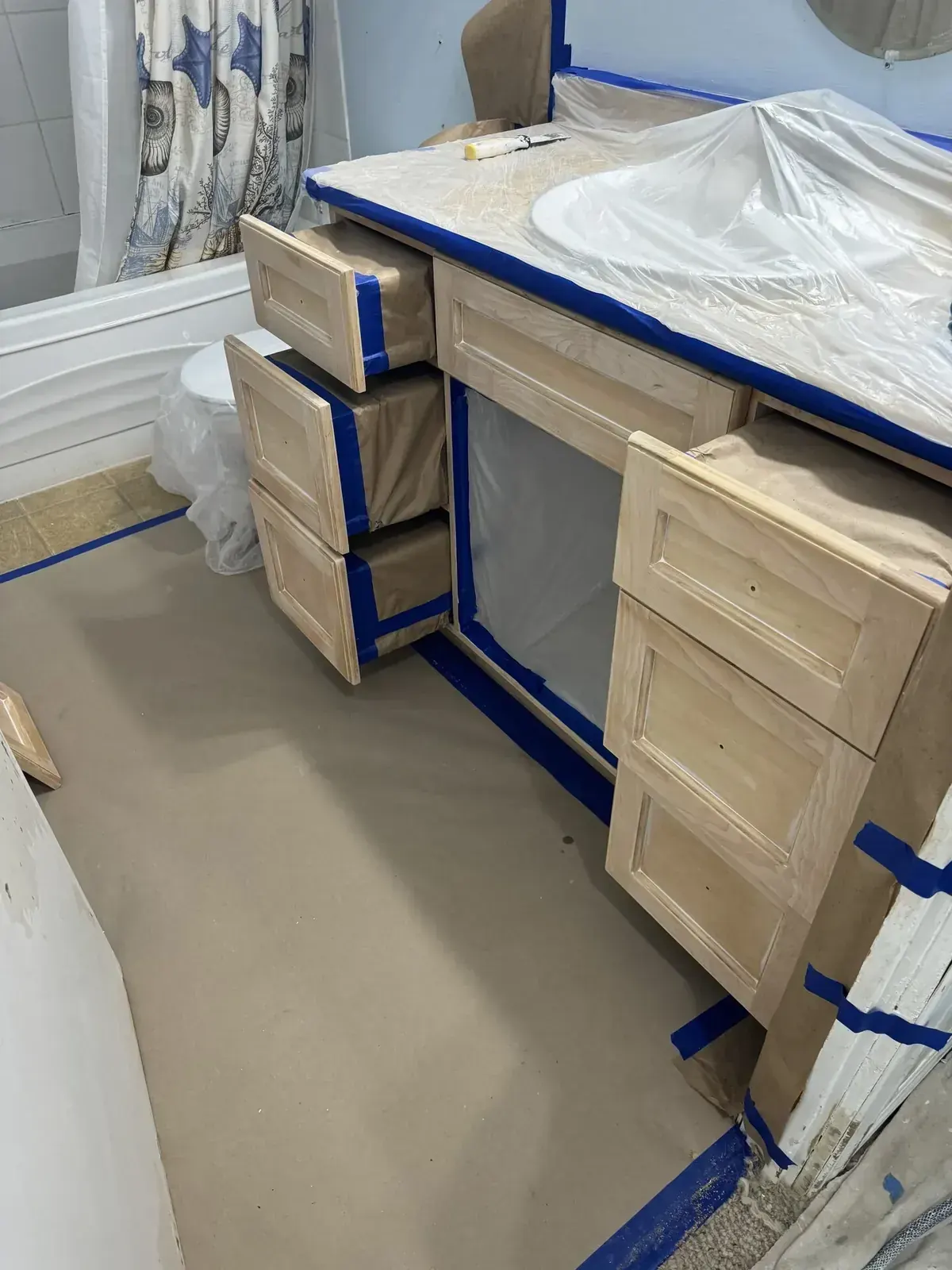 Cabinet doors being prepared for spray finishing